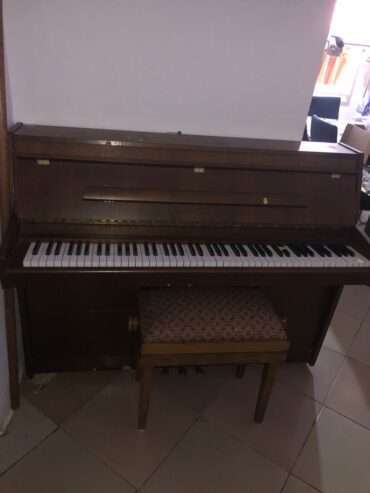 Upright Schimmel Piano