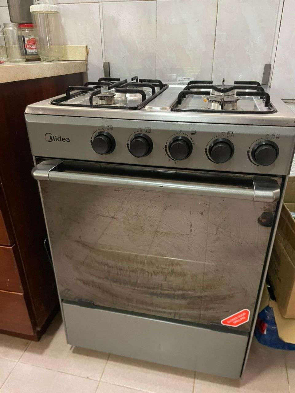 Midea Four burner gas cooker with oven & grill,