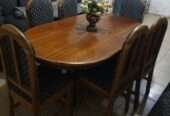 Wooden Dinning table with 6 matching chairs