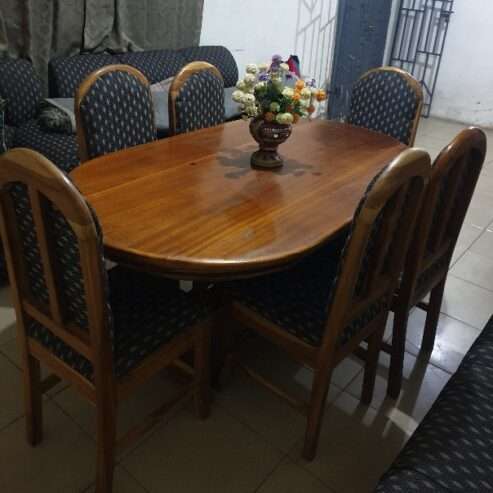 Wooden Dinning table with 6 matching chairs