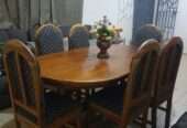 Wooden Dinning table with 6 matching chairs