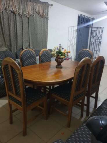 Wooden Dinning table with 6 matching chairs