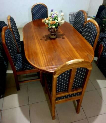 Wooden Dinning table with 6 matching chairs