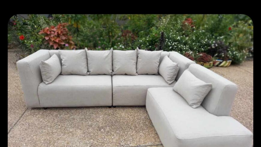 Beige sectional sofa.